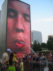 kids cooling off on a hot summer day at millenium park, c... by Lisa Lappe 
